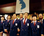 North Korean Kim Hyoung-jin (front, R), South Korean Kim Chang-jae (3rd L), South Korean Hyun Jung-hwa (2nd L) and North Korean Ryu Sun-bok at World TT championships