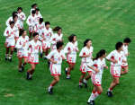 The Chinese soccer team warms up in Beijing