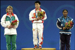 Karnam Malleshwari on the victory podium at the Sydney Games