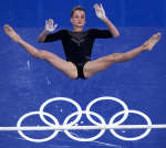 Svetlana Khorkina performs in the women's apparatus uneven bars. REUTERS/Dylan Martinez 