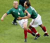 Mexico's Gerardo Torrado (L) celebrates his goal with team mate Joahan Rodriguez 