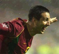 Pauleta celebrates after scoring his third goal.