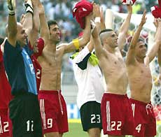 Turkey players rejoice after beating China 3-0