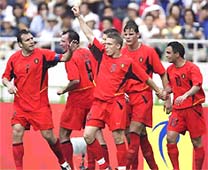 Belgium players celebrate after their victory over Russia on Friday.