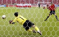 South Korea's goalie Lee Won-jae blocks Spain's Joaquin penalty kick during the penalty shoot-out. 